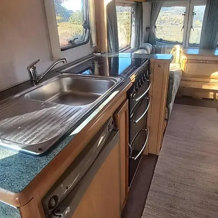A Very Neat Caravan For 4 With Amenities And View Of The Horses